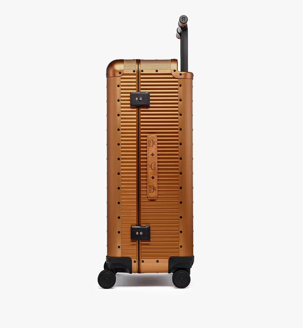 Large MCM X RAWROW Ottomar Check-In Trolley Gold