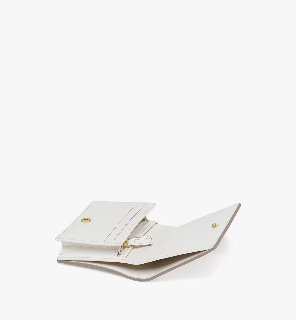 Mini Tracy Wallet in Embossed Monogram Leather White